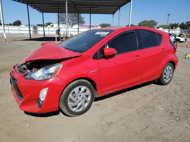 TOYOTA PRIUS C 2015 red hatchbac hybrid engine JTDKDTB34F1584069 photo #1