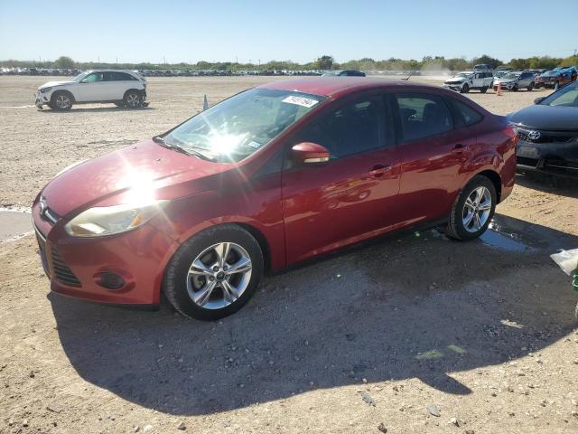 FORD FOCUS SE 2013 maroon sedan 4d gas 1FADP3F24DL372488 photo #1