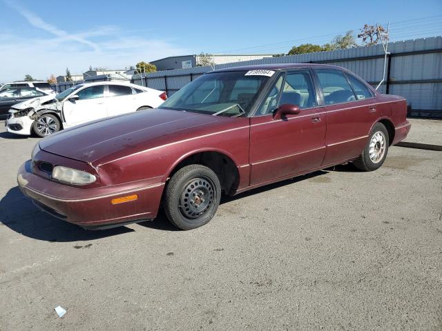 OLDSMOBILE 88 BASE 1997 maroon  gas 1G3HN52K4V4832490 photo #1