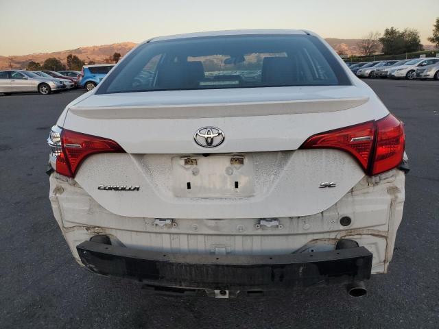 VIN 5YFBURHE8KP856379 2019 Toyota Corolla, L no.6