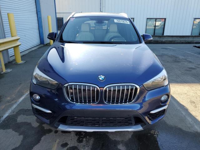 VIN WBXHT3C39J5F90128 2018 BMW X1 no.5