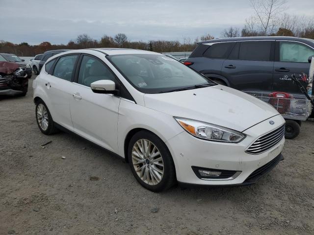 VIN 1FADP3N27JL325176 2018 Ford Focus, Titanium no.4