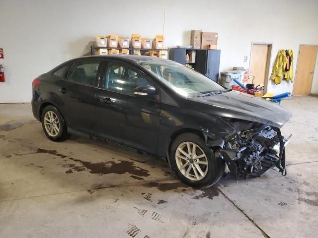 VIN 1FADP3F23HL281153 2017 Ford Focus, SE no.4