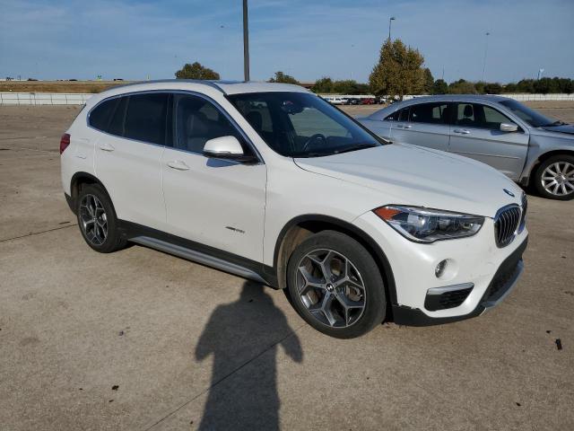 VIN WBXHT3C36H5F73930 2017 BMW X1 no.4