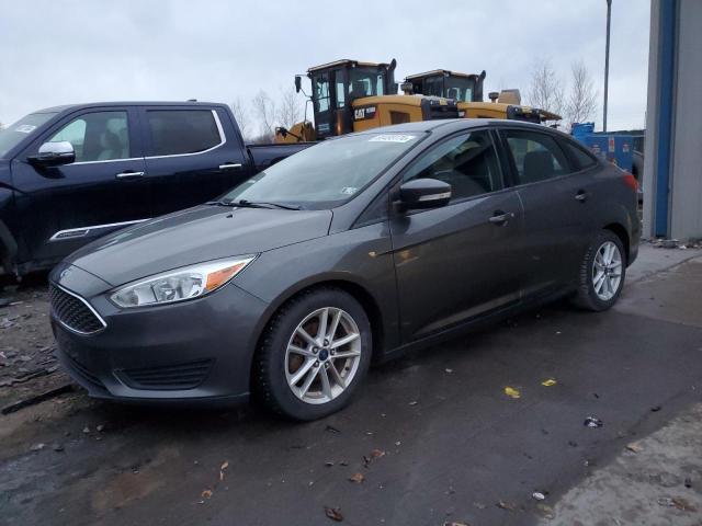 FORD FOCUS SE 2015 gray sedan 4d gas 1FADP3F22FL213763 photo #1