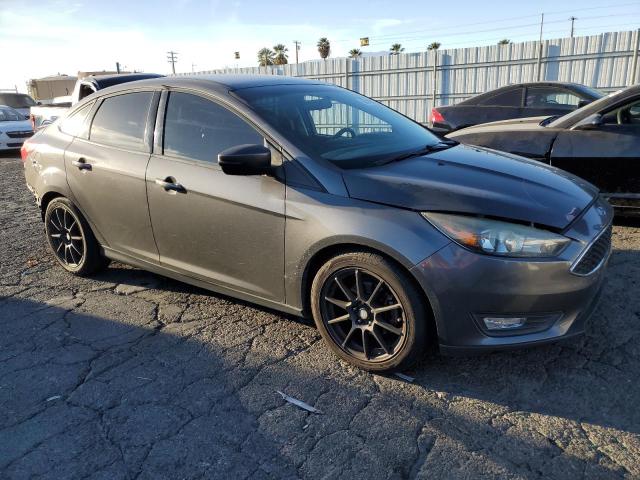 VIN 1FADP3F27FL294369 2015 Ford Focus, SE no.4