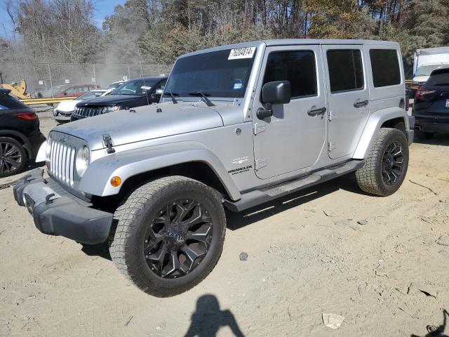 JEEP WRANGLER U 2011 silver 4dr spor gas 1J4BA5H16BL627992 photo #1