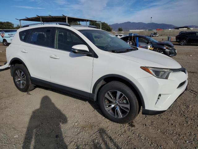 VIN JTMWFREV4GJ073975 2016 TOYOTA RAV4 no.4