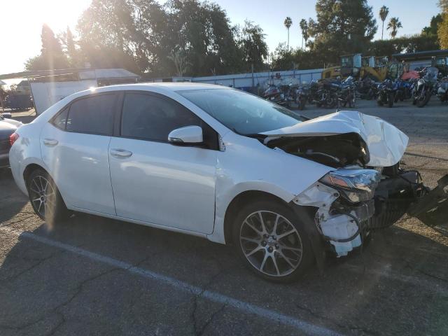 VIN 5YFBURHE8HP627631 2017 TOYOTA COROLLA no.4