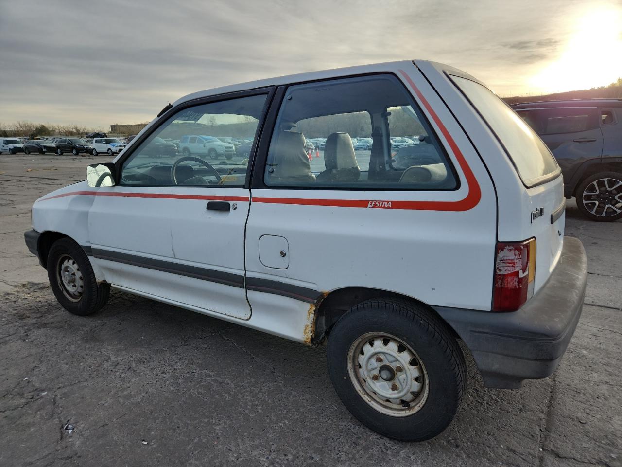 Lot #3302152141 1989 FORD FESTIVA L