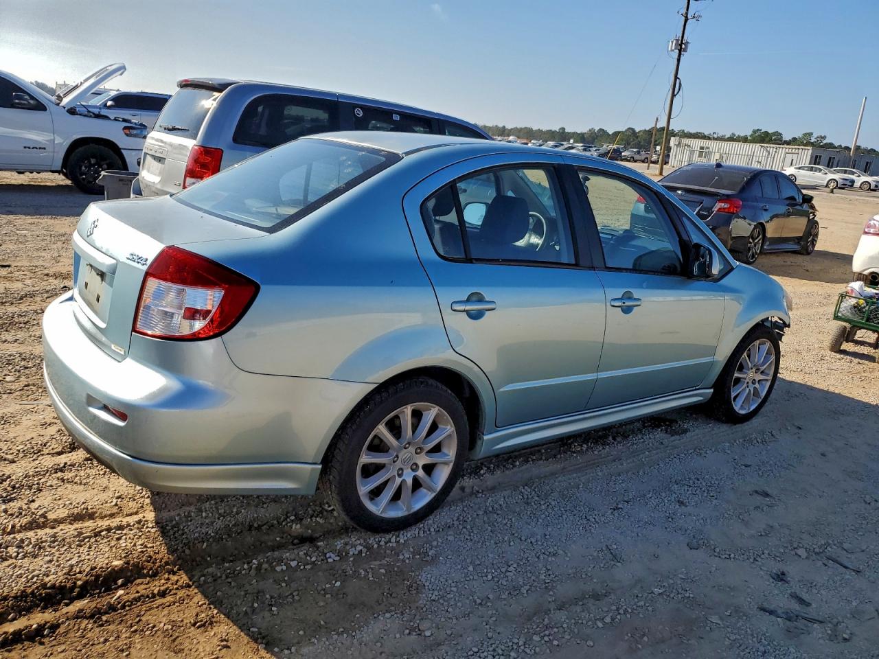 Lot #3298129174 2009 SUZUKI SX4 TOURIN