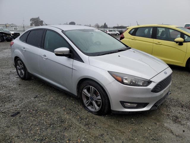 VIN 1FADP3FE0HL285199 2017 Ford Focus, SE no.4