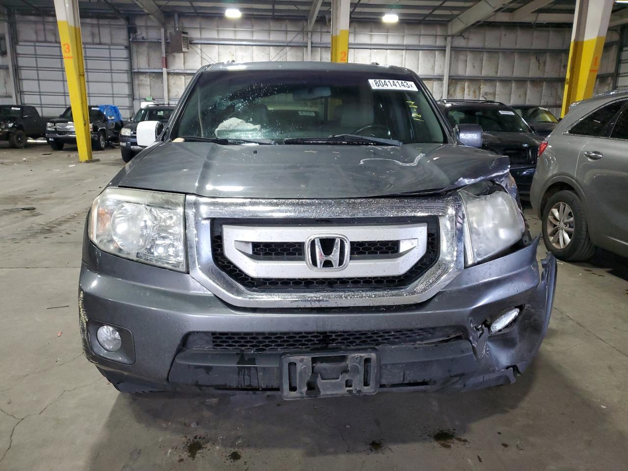 5FNYF4H57BB057051 2011 Honda Pilot Exl