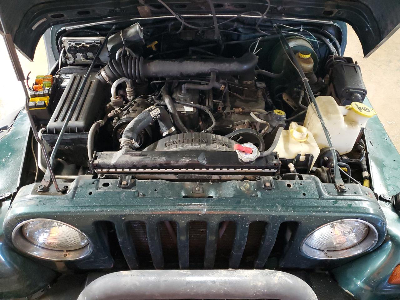 1j4fy49s6xp496061 1J4FY49S6XP496061 1999 Jeep Wrangler / Tj Sahara