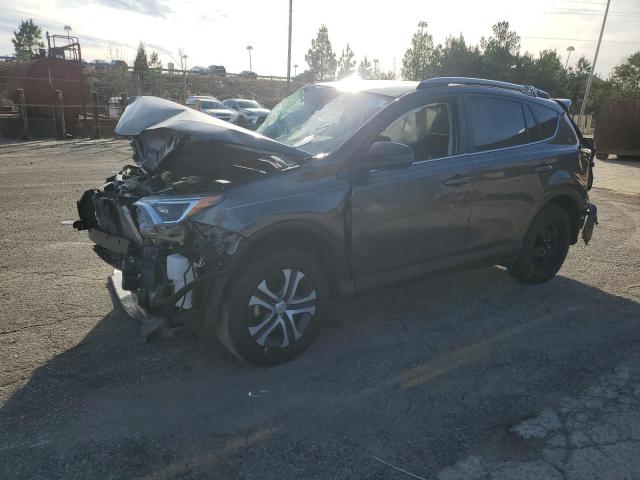 VIN JTMZFREV9JJ749518 2018 Toyota RAV4, LE no.1