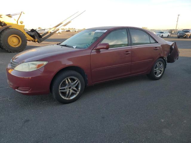 2003 Toyota Camry Le VIN: 4T1BE32K33U700128 Lot: 77719663