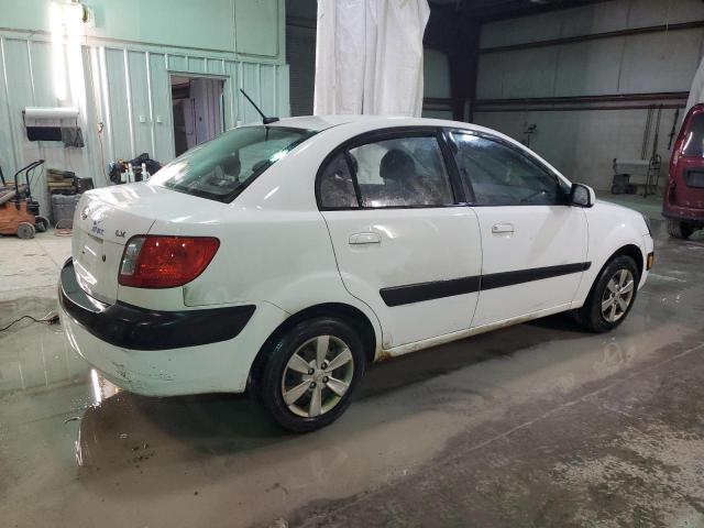 2009 Kia Rio Base VIN: KNADE223696496063 Lot: 79817883