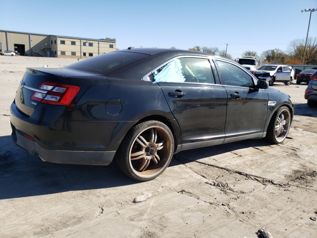 1FAHP2D99EG129975 2014 Ford Taurus Se