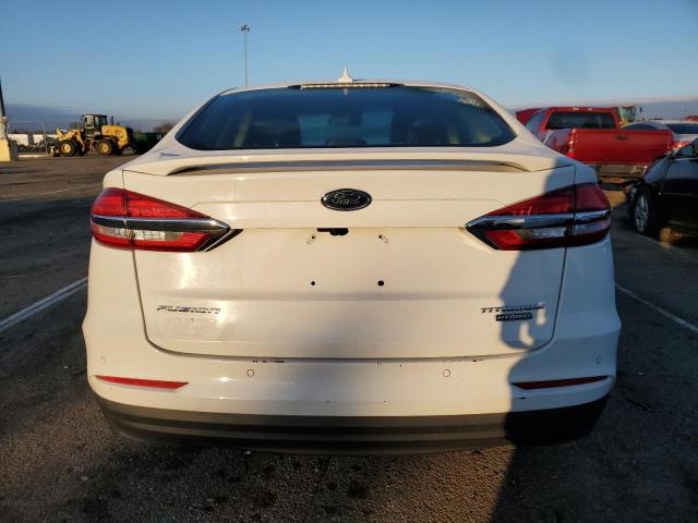 Lot #2246502665 2020 FORD FUSION TIT salvage car