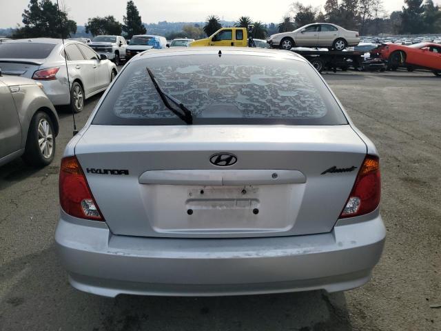 2004 Hyundai Accent Gl VIN: KMHCG35C84U299695 Lot: 80607853