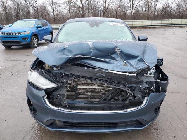 3FA6P0T97KR165097 Ford Fusion SE 5