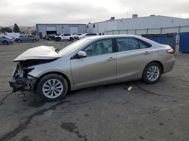 TOYOTA CAMRY LE 2015 tan  gas 4T4BF1FK0FR467329 photo #1