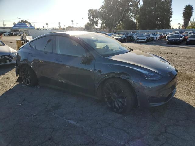 VIN 7SAYGDEF6NF394912 2022 TESLA MODEL Y no.4