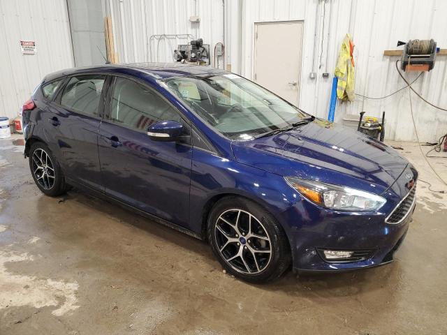 VIN 1FADP3M24HL327818 2017 FORD FOCUS no.4