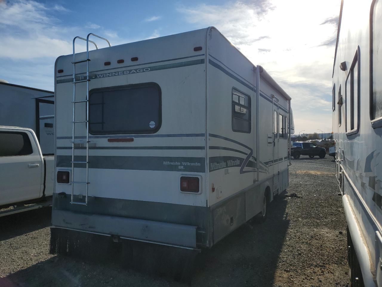 Lot #3038020210 1997 WINNEBAGO MOTORHOME