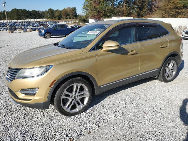 LINCOLN MKC 2015 gold 4dr spor gas 5LMTJ2AH4FUJ05130 photo #1