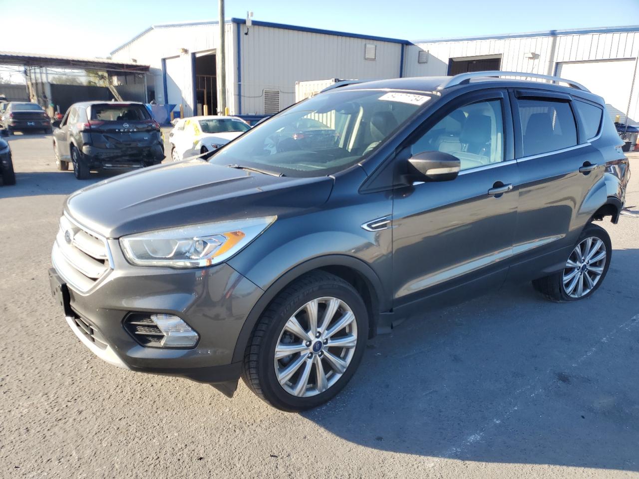 1FMCU0JD8HUD25790 FORD ESCAPE TIT 2017