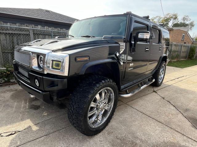 HUMMER H2 2004 black 4dr spor gas 5GRGN23U14H115951 photo #3