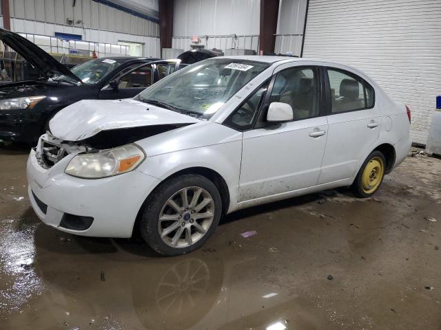 SUZUKI SX4 LE 2011 white sedan 4d gas JS2YC5A29B6302397 photo #1