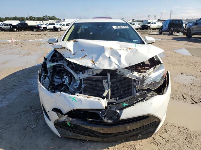 VIN 5YFBURHE0JP794409 2018 TOYOTA COROLLA no.5