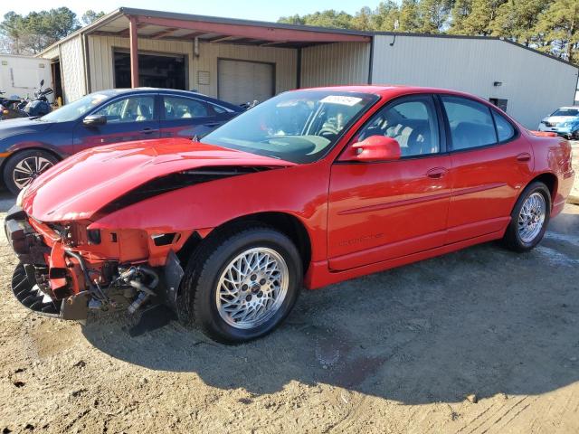 PONTIAC GRAND PRIX 2000 red  gas 1G2WP52K0YF230264 photo #1