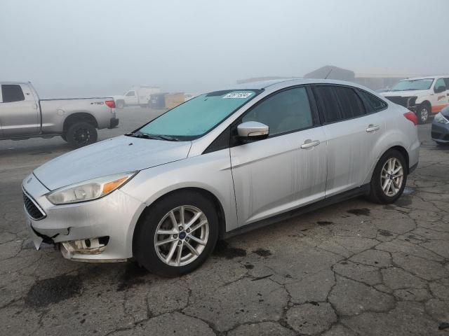 VIN 1FADP3F25FL281622 2015 FORD FOCUS no.1