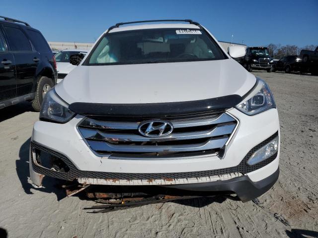 2015 HYUNDAI SANTA FE S - 5XYZU3LB4FG284679