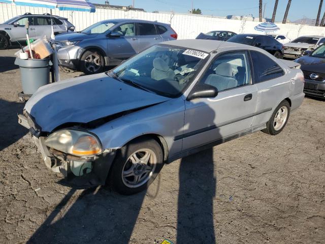 HONDA CIVIC DX 1997 silver  gas 1HGEJ6125VL011041 photo #1