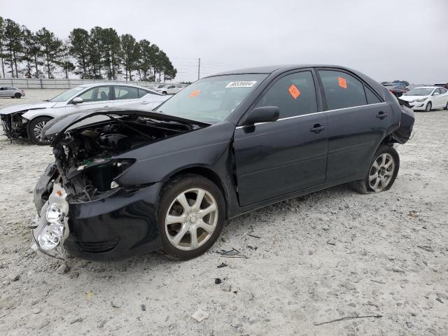 TOYOTA CAMRY LE 2005 black  gas JTDBE32K053018658 photo #1