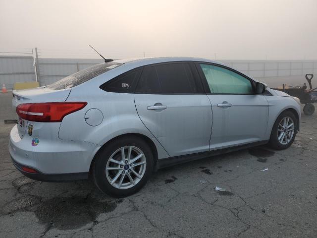 VIN 1FADP3F25FL281622 2015 FORD FOCUS no.3