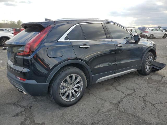 CADILLAC XT4 PREMIU 2021 black  gas 1GYFZDR4XMF016846 photo #4