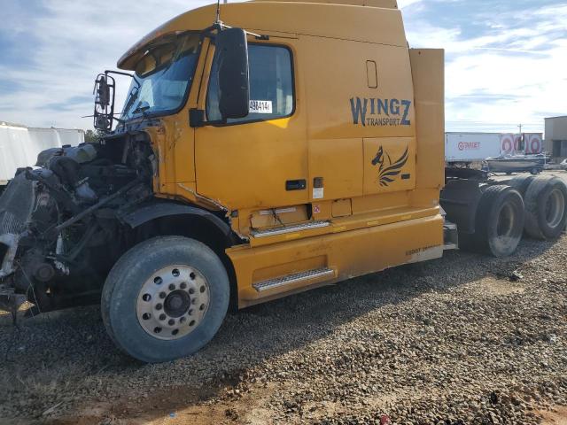 VOLVO VN 1999 yellow  diesel 4VG7DBRJ2XN796894 photo #1