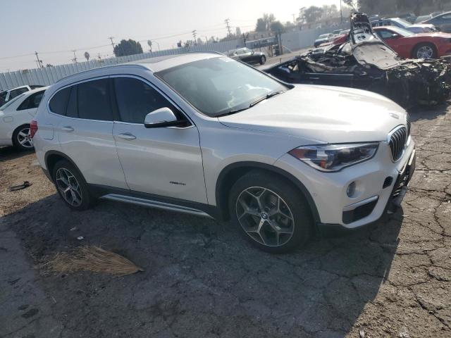 VIN WBXHU7C39H5H37093 2017 BMW X1 no.4