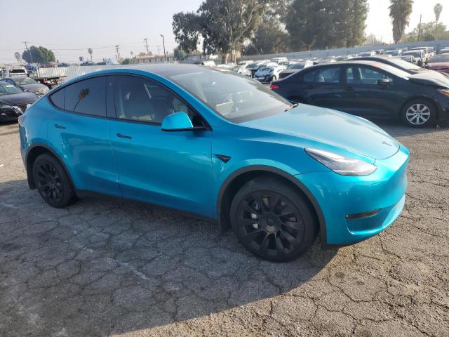 VIN 7SAYGDEE6PA102117 2023 TESLA MODEL Y no.4