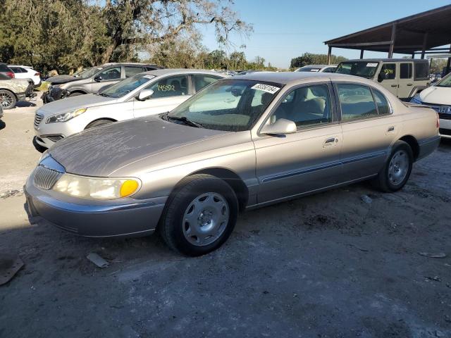 LINCOLN CONTINENTA 2000 beige  gas 1LNHM97V4YY832947 photo #1