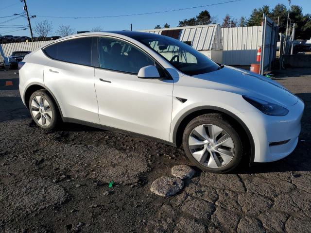 VIN 7SAYGDEE3PA160945 2023 TESLA MODEL Y no.4