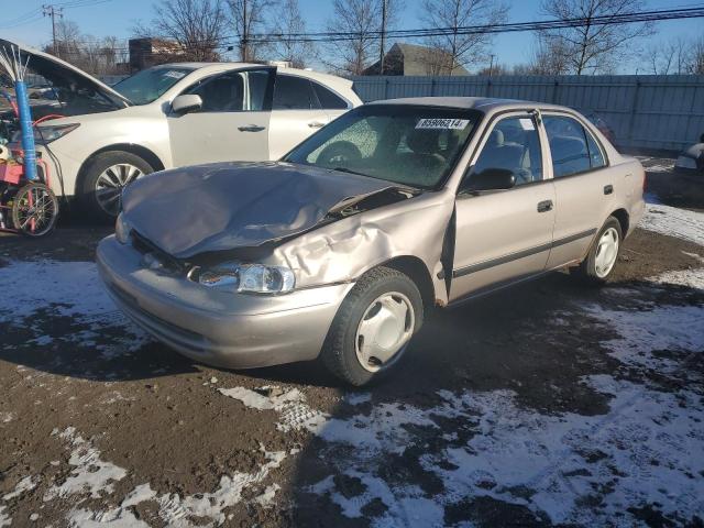 CHEVROLET GEO PRIZM 2001 tan sedan 4d gas 1Y1SK52861Z406151 photo #1